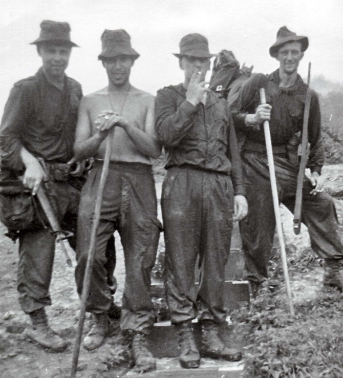  FIO Ba-Kelalan after an Op CLARET mission 1965.  Dave Hollinshead (L), with two gunners from 38 Bty RA, and RAMC medic. 