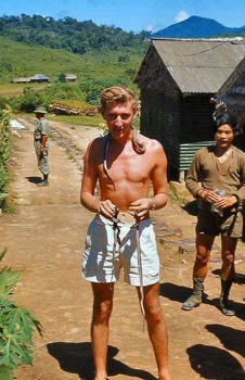  'Jack' Cartwright, FIO Long Banga Jack having been presented with 3 baby pythons by local Penan tribe. 